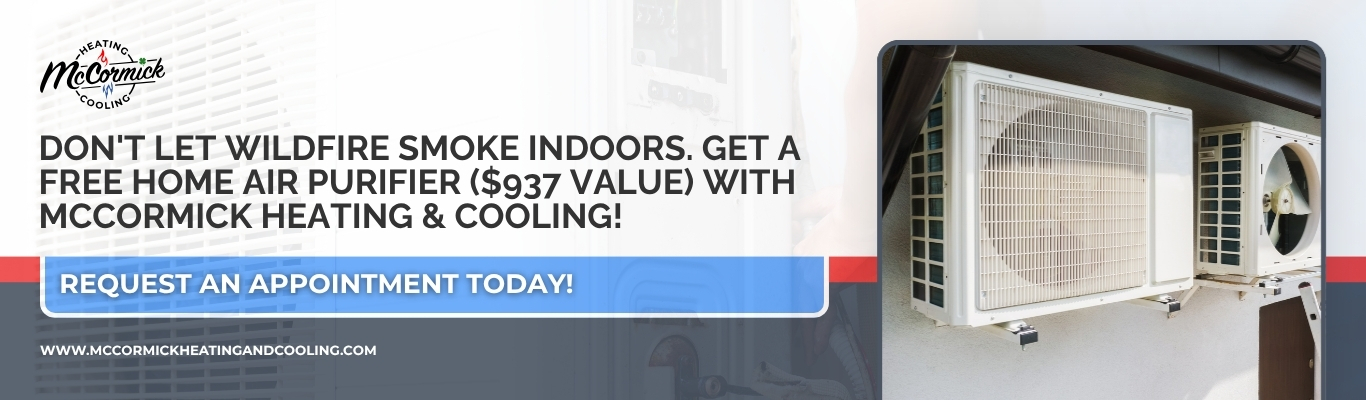 Two outdoor AC condenser units mounted on a home wall with a promotion for a free home air purifier system
